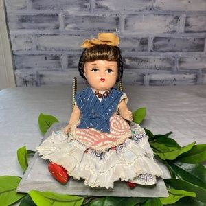 Vintage unmarked rubber band tied doll